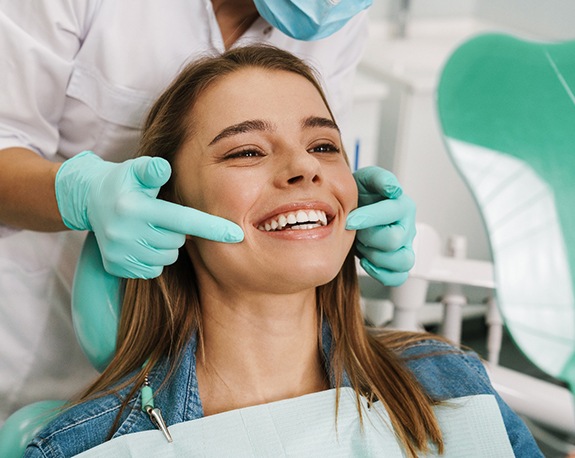 Woman smiling in the dental chair