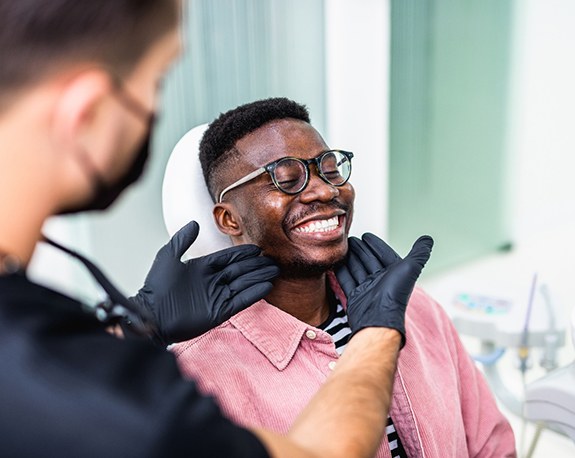 Man smiling at the endodontist