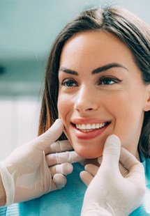 young patient smiling while visiting dentist 