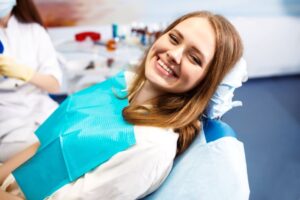 Happy patient in treatment chair